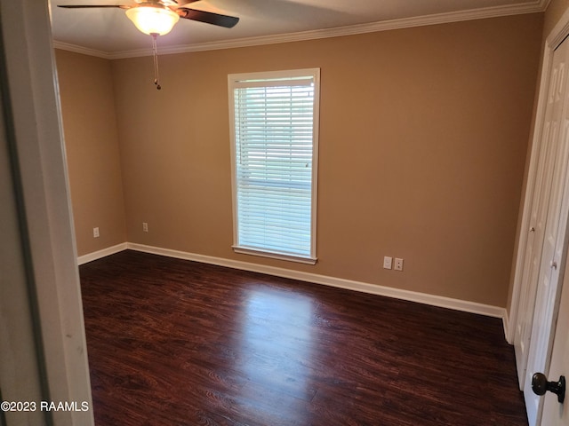 unfurnished bedroom featuring ceiling fan, dark hardwood / wood-style flooring, and ornamental molding