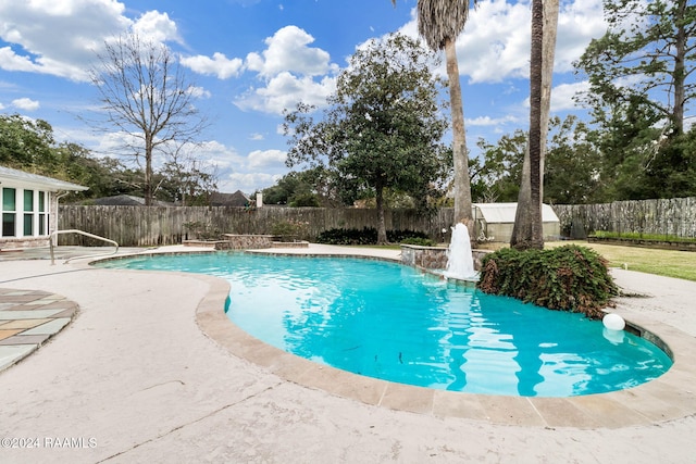 view of pool featuring pool water feature