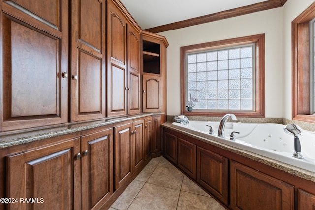 bathroom featuring tile patterned flooring, a tub, and crown molding