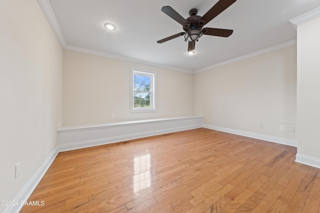 unfurnished room with light hardwood / wood-style floors, ceiling fan, and ornamental molding