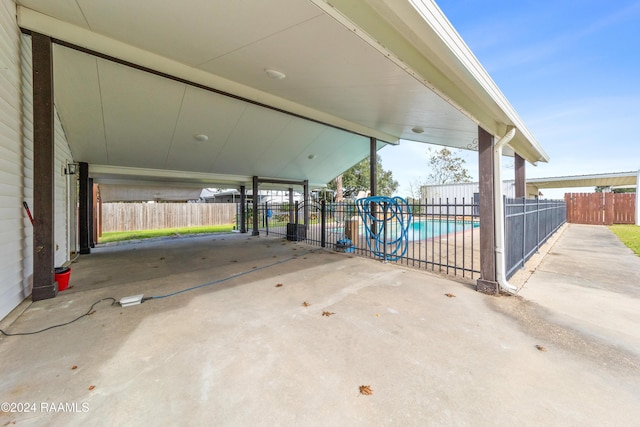 view of patio with a fenced in pool