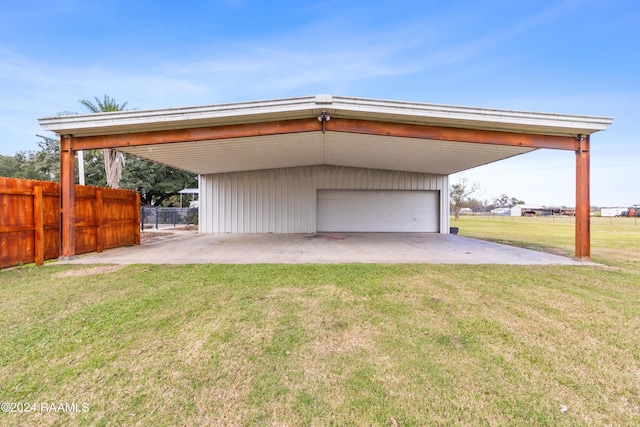 garage with a lawn