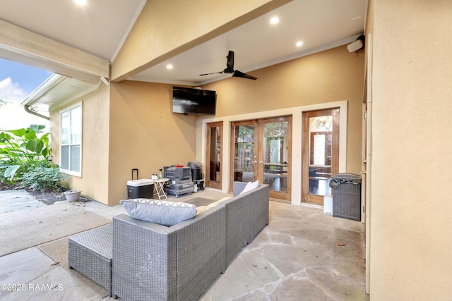 view of patio with french doors and ceiling fan