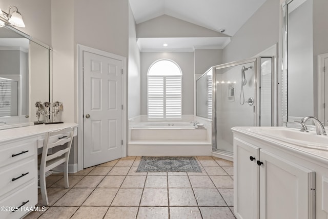 bathroom with tile patterned flooring, vanity, lofted ceiling, and independent shower and bath