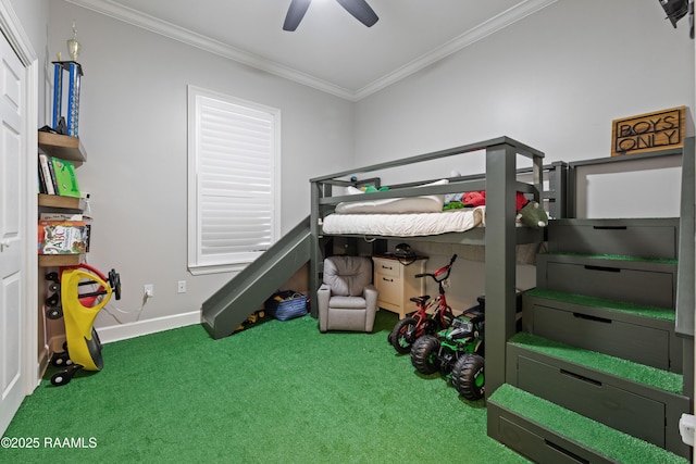 bedroom with crown molding, ceiling fan, and carpet flooring