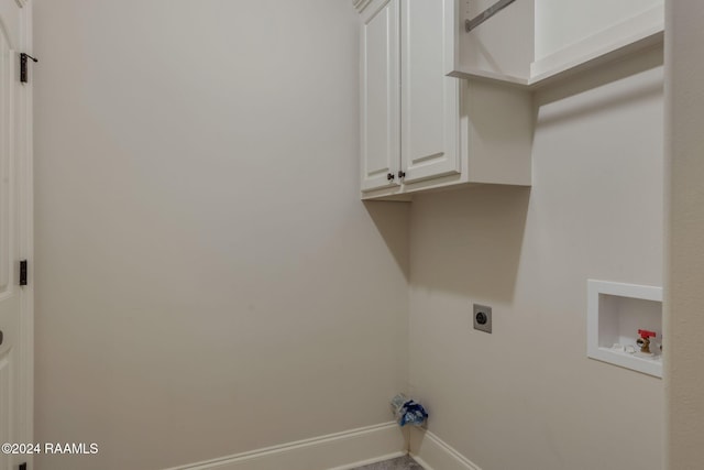 laundry area featuring washer hookup, electric dryer hookup, and cabinets