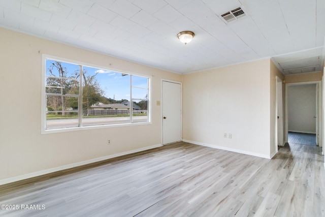 empty room featuring light hardwood / wood-style floors