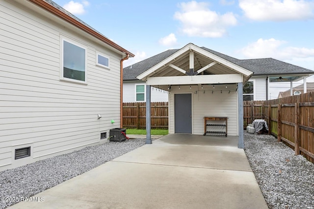 view of patio / terrace with an outbuilding