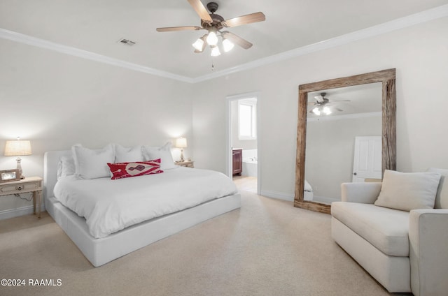 carpeted bedroom with ensuite bath, ceiling fan, and crown molding