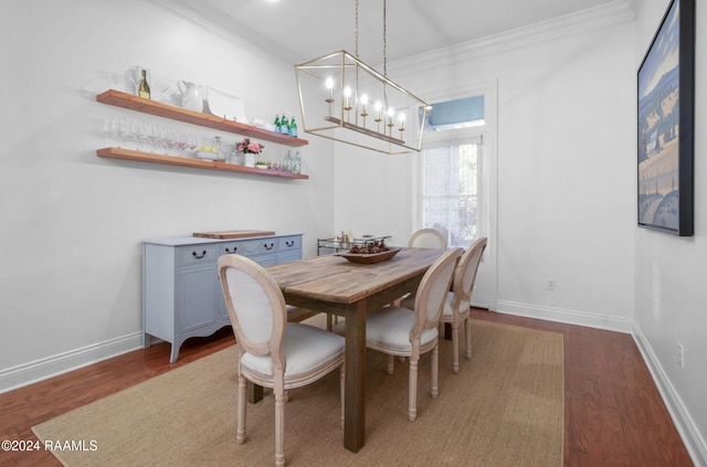 dining room featuring crown molding and hardwood / wood-style floors