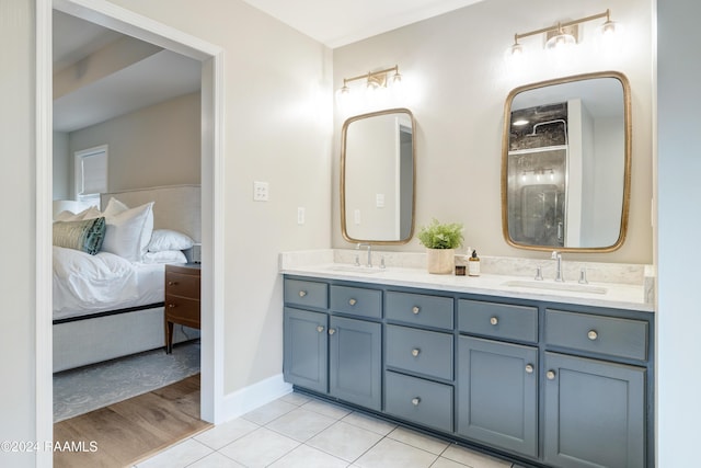 bathroom featuring vanity and wood-type flooring