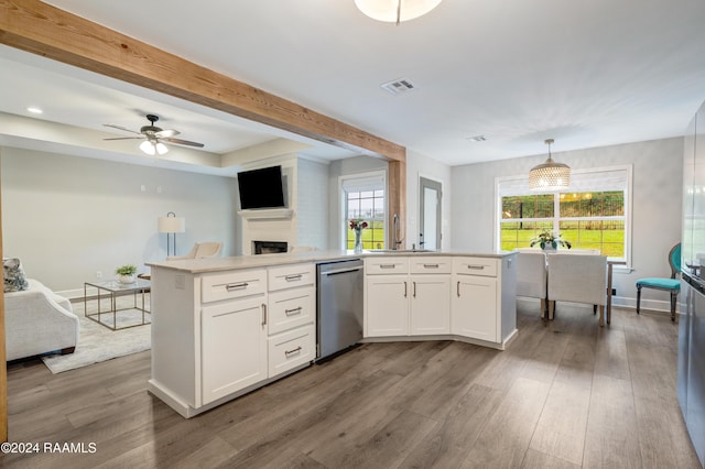 kitchen with white cabinetry, dishwasher, ceiling fan, pendant lighting, and hardwood / wood-style flooring