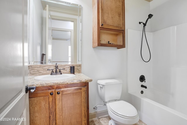 full bathroom with vanity, tasteful backsplash, toilet, and shower / bathtub combination