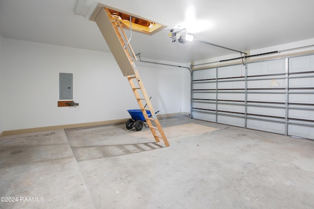 garage featuring a garage door opener and electric panel