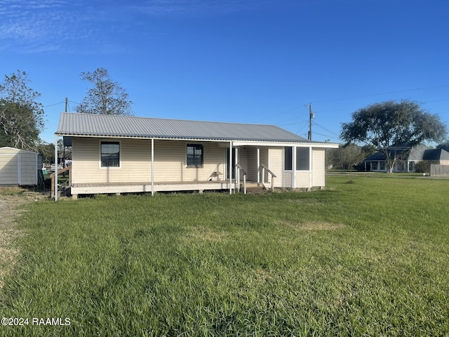 view of front of home with a front yard