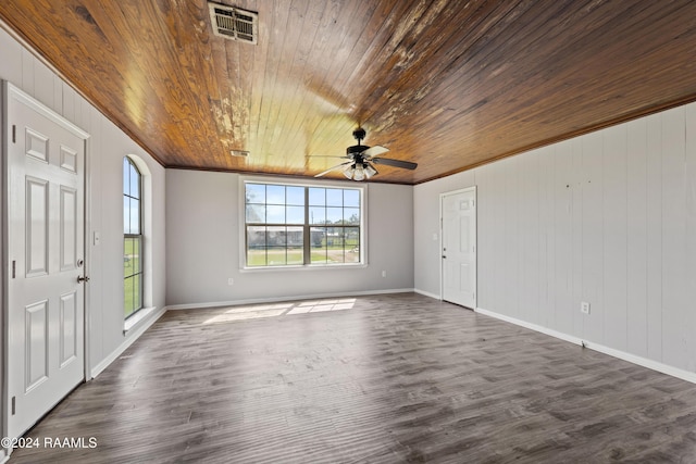 entryway with dark wood-type flooring, ceiling fan, ornamental molding, and wooden ceiling