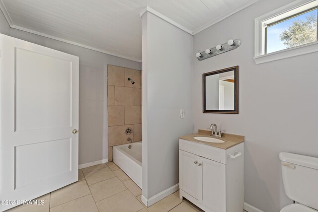 full bathroom featuring vanity, toilet, tiled shower / bath combo, and tile patterned flooring