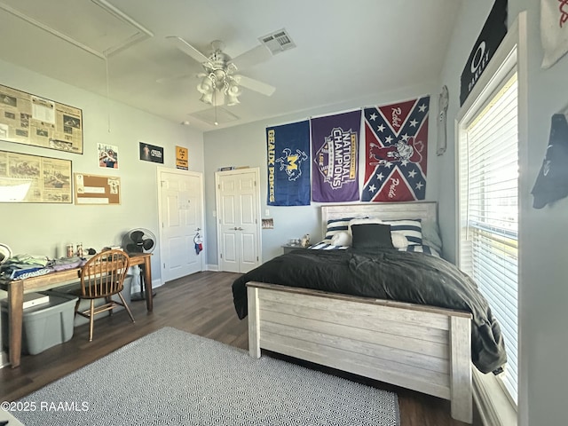 133 Lighthouse Ln, Lake Charles, LA 70607 - bedroom featuring attic access, wood finished floors, and a ceiling fan