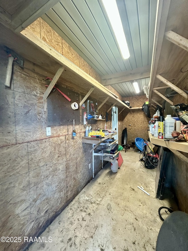 133 Lighthouse Ln, Lake Charles, LA 70607 - miscellaneous room with a workshop area and unfinished concrete floors