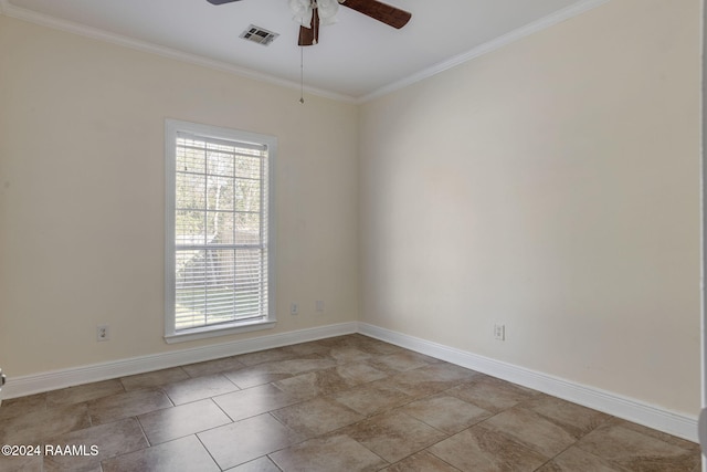 unfurnished room featuring ceiling fan and ornamental molding