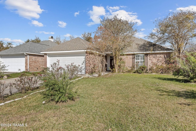 single story home with a garage and a front yard