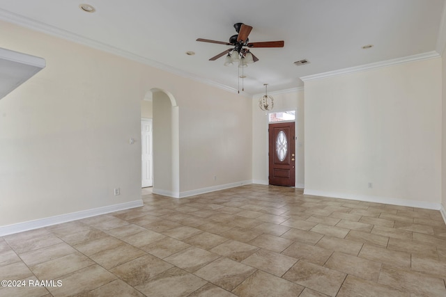 foyer entrance featuring ceiling fan and ornamental molding