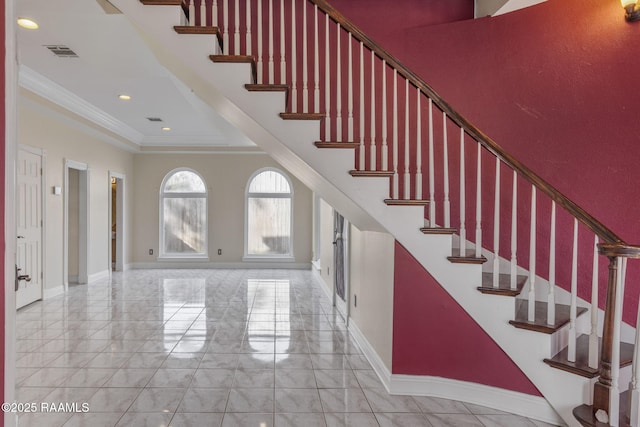 stairway with crown molding