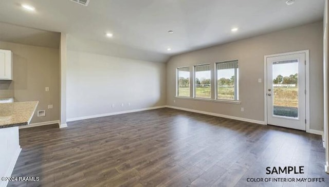 unfurnished living room featuring dark wood-type flooring