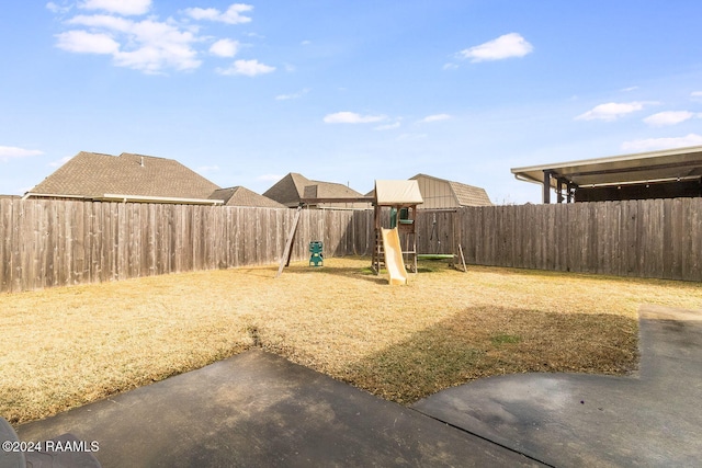 view of yard with a playground