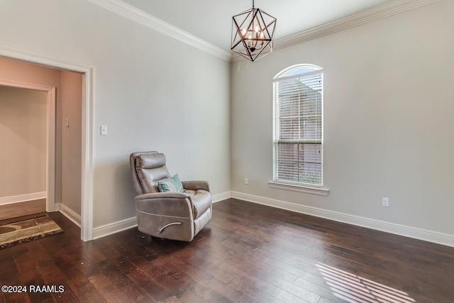 living area featuring a wealth of natural light, crown molding, dark hardwood / wood-style floors, and a notable chandelier