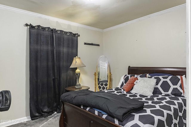 bedroom featuring crown molding and carpet