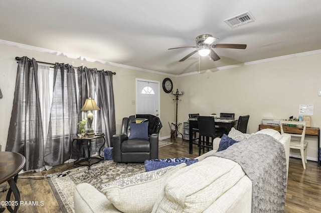 living room featuring ceiling fan, dark hardwood / wood-style flooring, and crown molding