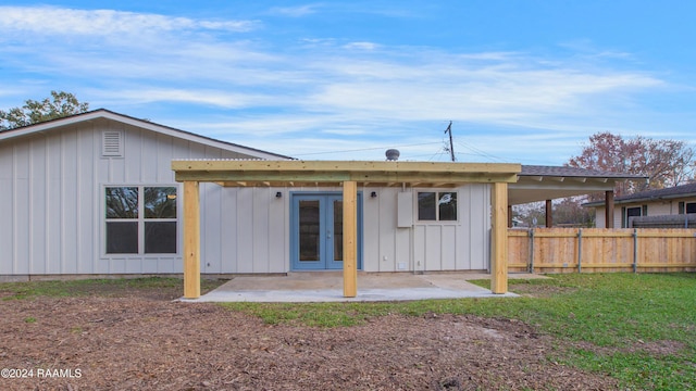 rear view of property featuring a patio