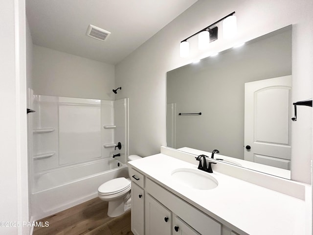 304 Weaver Way, Maurice, LA 70555 - full bath with wood finished floors, vanity, toilet, and shower / washtub combination