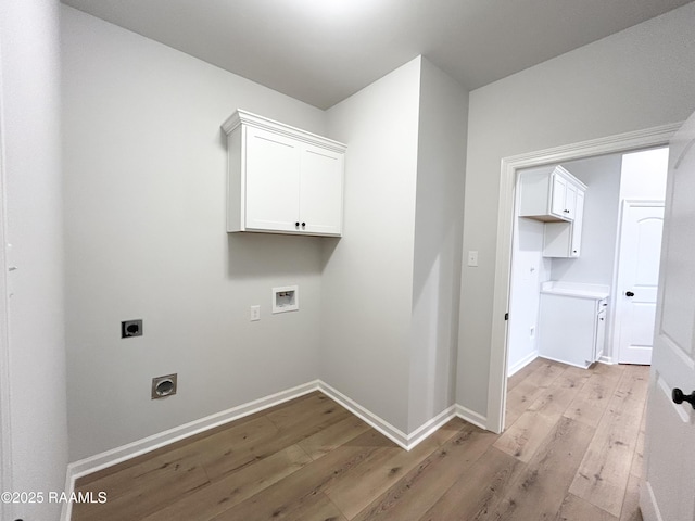 304 Weaver Way, Maurice, LA 70555 - laundry area featuring hookup for an electric dryer, hookup for a washing machine, light wood-style floors, and baseboards