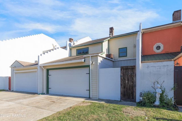 view of front of home featuring a garage