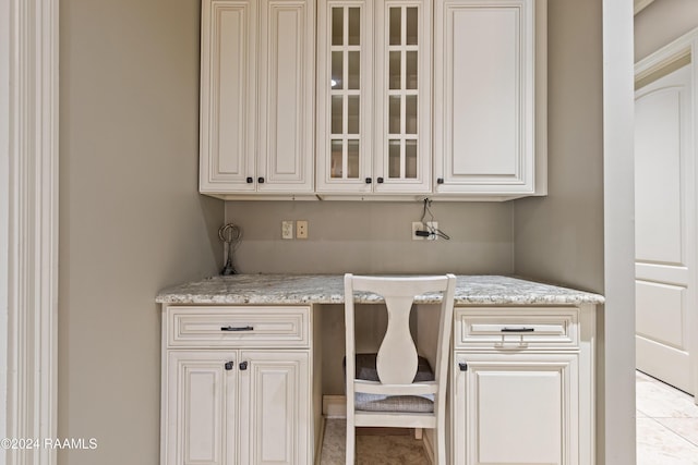 washroom with light tile patterned floors