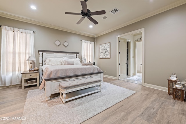 bedroom with ceiling fan, light hardwood / wood-style flooring, and ornamental molding