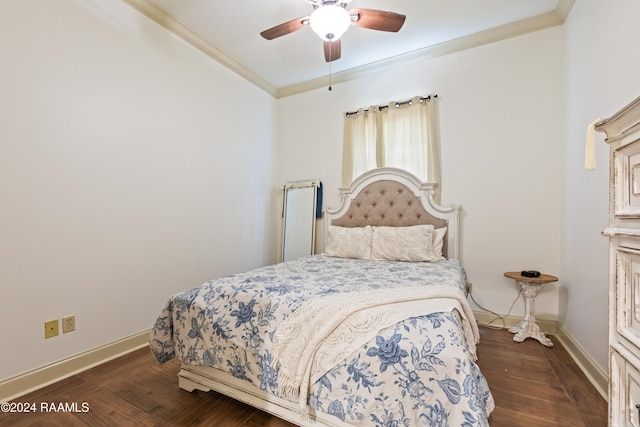 bedroom with ceiling fan, dark hardwood / wood-style floors, and ornamental molding