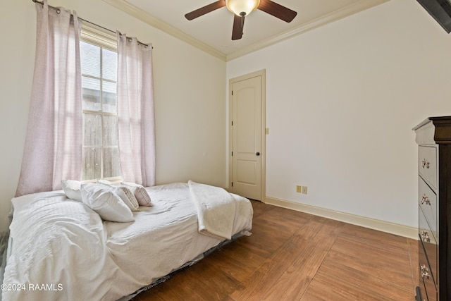 bedroom with hardwood / wood-style flooring, ceiling fan, and ornamental molding