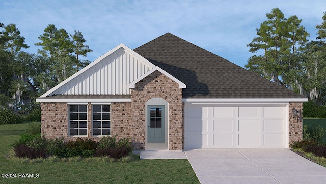 view of front facade featuring a garage and a front lawn