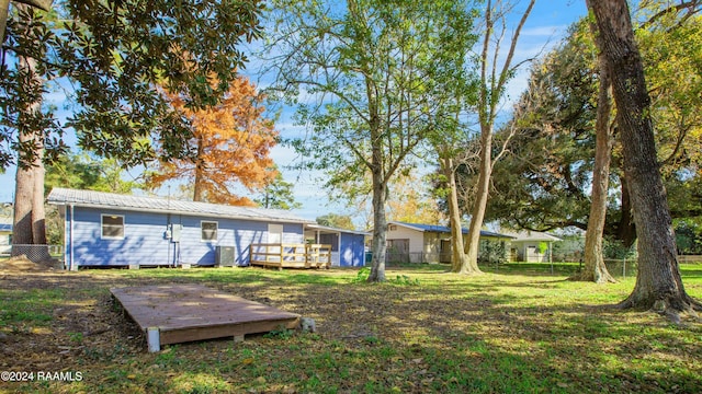 view of yard featuring a deck