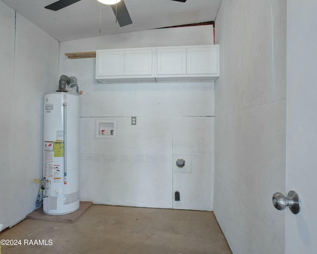 washroom with cabinets, hookup for a washing machine, ceiling fan, and water heater