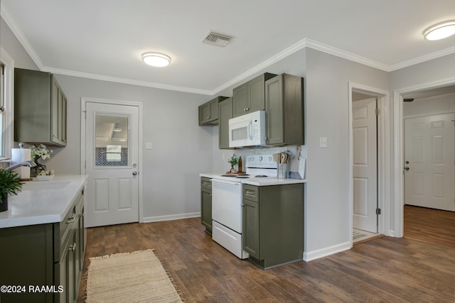 kitchen featuring crown molding, sink, dark wood-type flooring, and white appliances