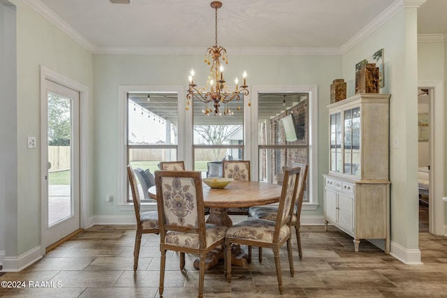 dining space with ornamental molding and an inviting chandelier