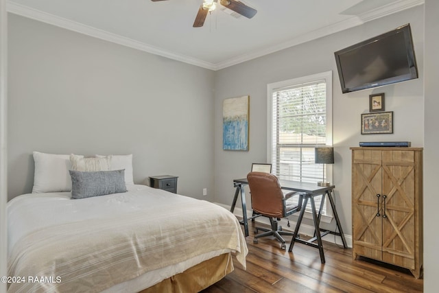 bedroom with hardwood / wood-style flooring, ornamental molding, and ceiling fan