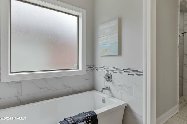 bathroom featuring a bathtub