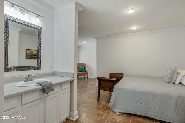 bedroom with crown molding, tile patterned flooring, and sink