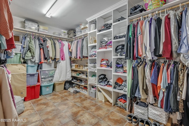 spacious closet with tile patterned flooring