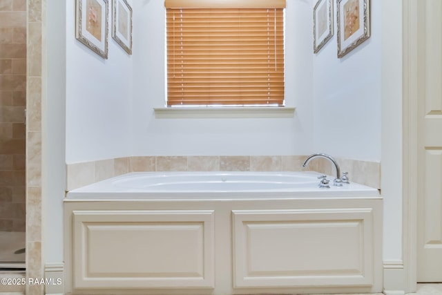 bathroom featuring separate shower and tub